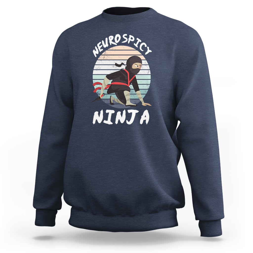 Navy crewneck sweatshirt with “Neurospicy Ninja” graphic on chest