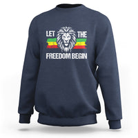 Navy crewneck sweatshirt with lion graphic and 'LET THE FREEDOM BEGIN' print
