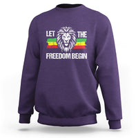Purple crewneck sweatshirt with lion graphic and 'LET THE FREEDOM BEGIN' print