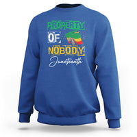 Royal blue Juneteenth sweatshirt with front graphic text "PROPERTY OF NOBODY"