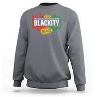 Charcoal gray crewneck sweatshirt with long sleeves and colorful back graphic print