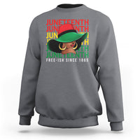 Charcoal gray crewneck sweatshirt with colorful Juneteenth graphic and “Free-ish since 1865” text