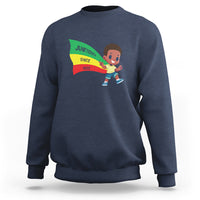 Kids crewneck sweatshirt in navy blue with Juneteenth graphic on front
