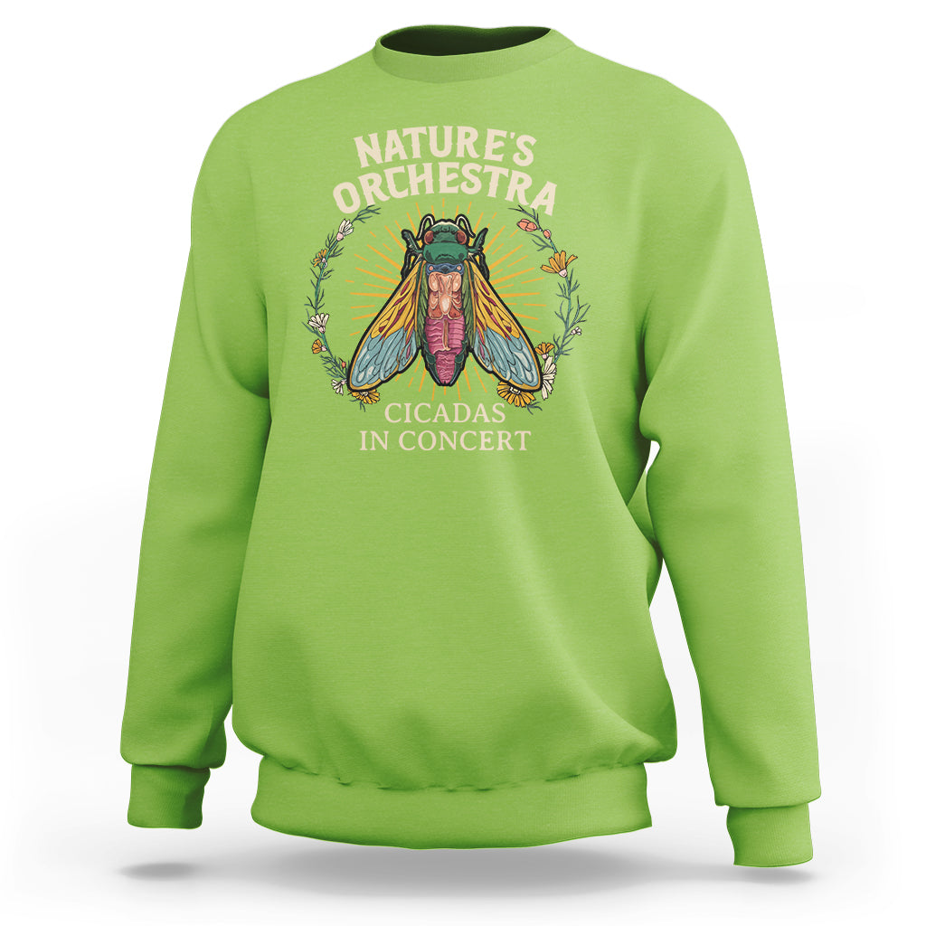 Lime green crewneck sweatshirt with cicada concert graphic and 'Nature's Orchestra' text.