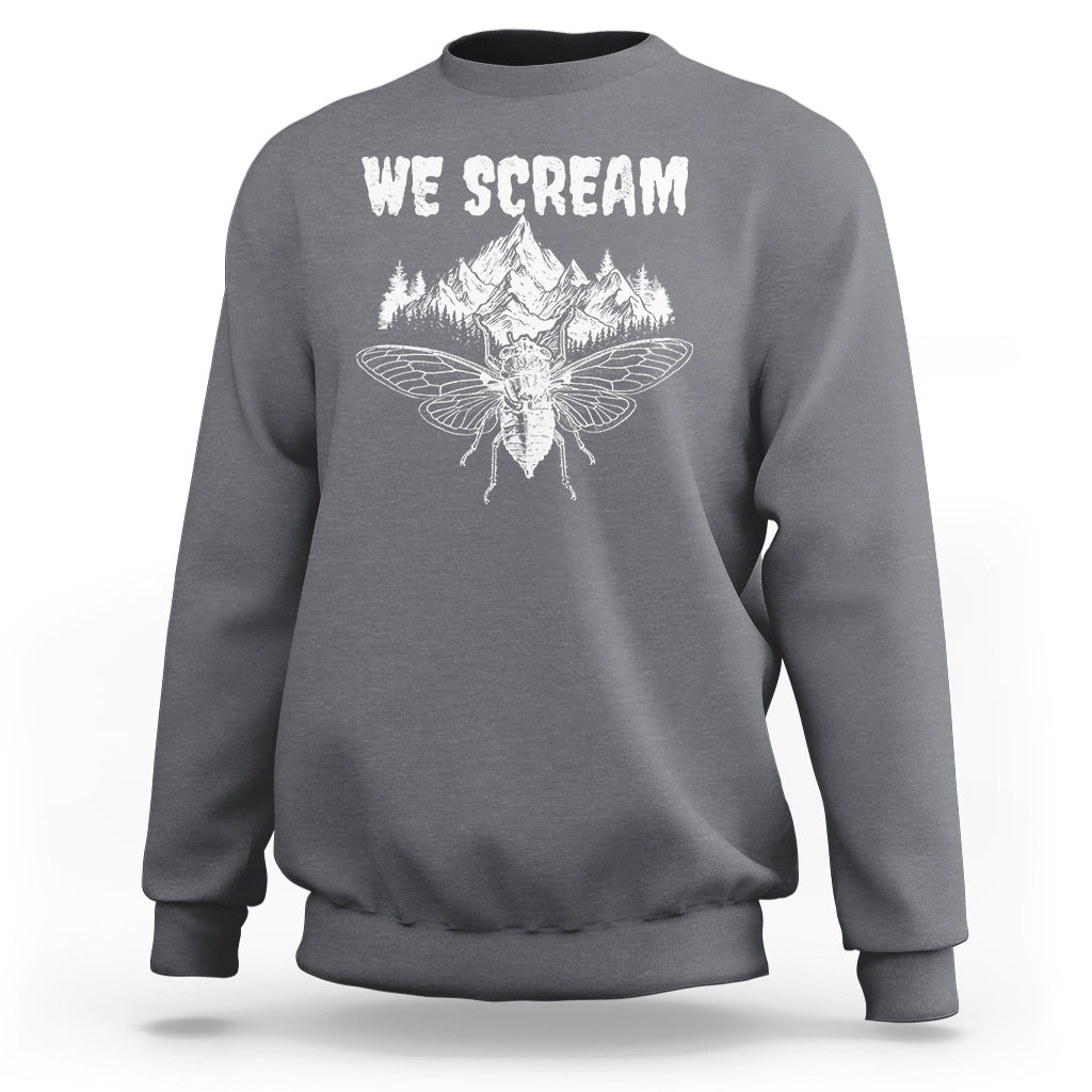 Light gray crewneck sweatshirt with 'WE SCREAM' and cicada wings graphic
