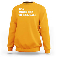 Yellow math teacher crewneck sweatshirt with 'good day to do math' graphic print