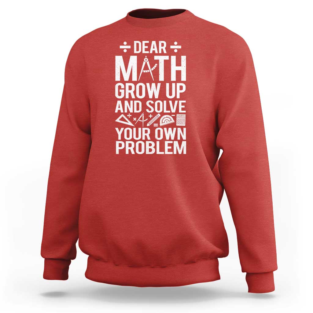 Red sweatshirt with 'DEAR MATH' graphic, crew neck and long sleeves.