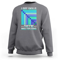 Light gray crewneck sweatshirt with colorful math skills graphic on front