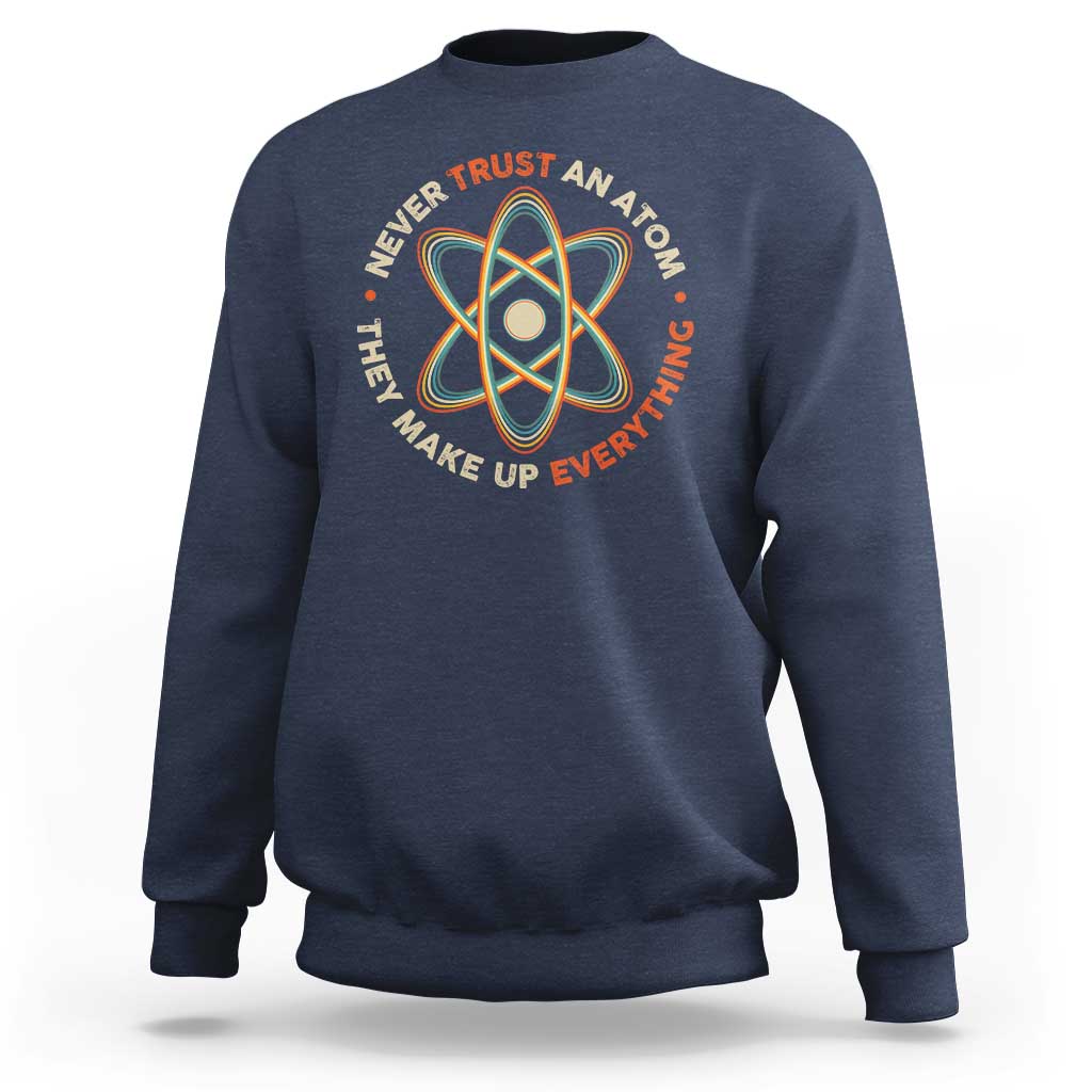 Navy science sweatshirt with colorful atom graphic and slogan at chest