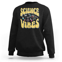 Black crewneck sweatshirt with “SCIENCE VIBES” science-themed graphic on chest