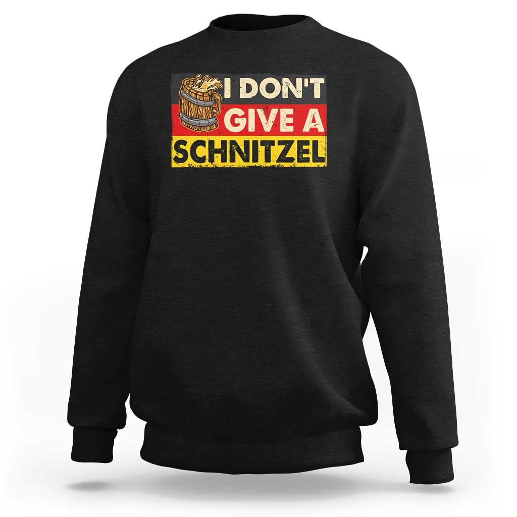 Black crewneck sweatshirt with "I DON'T GIVE A SCHNITZEL" graphic and beer mug