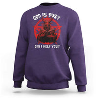 Men's graphic sweatshirt in purple with red goat emblem and 'GOD IS BUSY' text