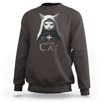 Dark chocolate brown sweatshirt with front cat nun graphic and “The Cat” text