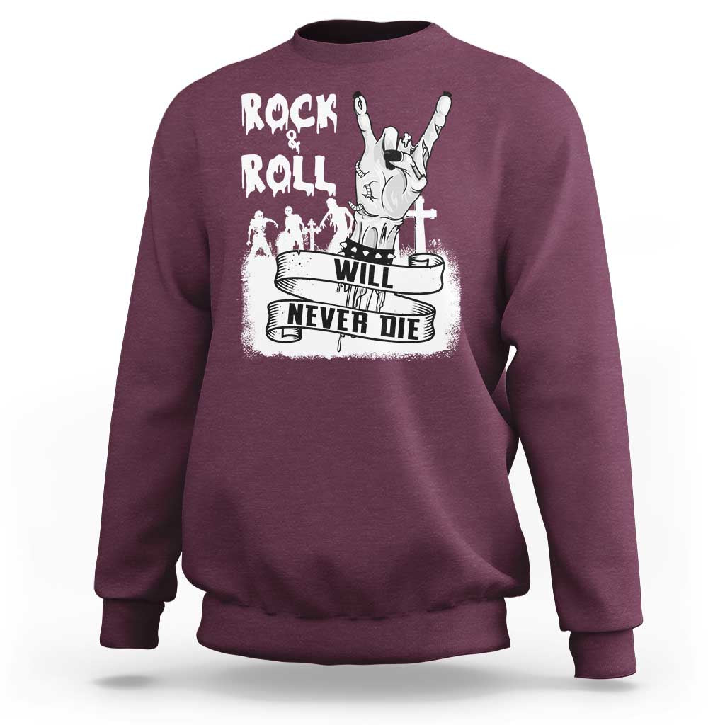 Maroon crewneck sweatshirt with zombie guitar graphic and 'Will Never Die' text