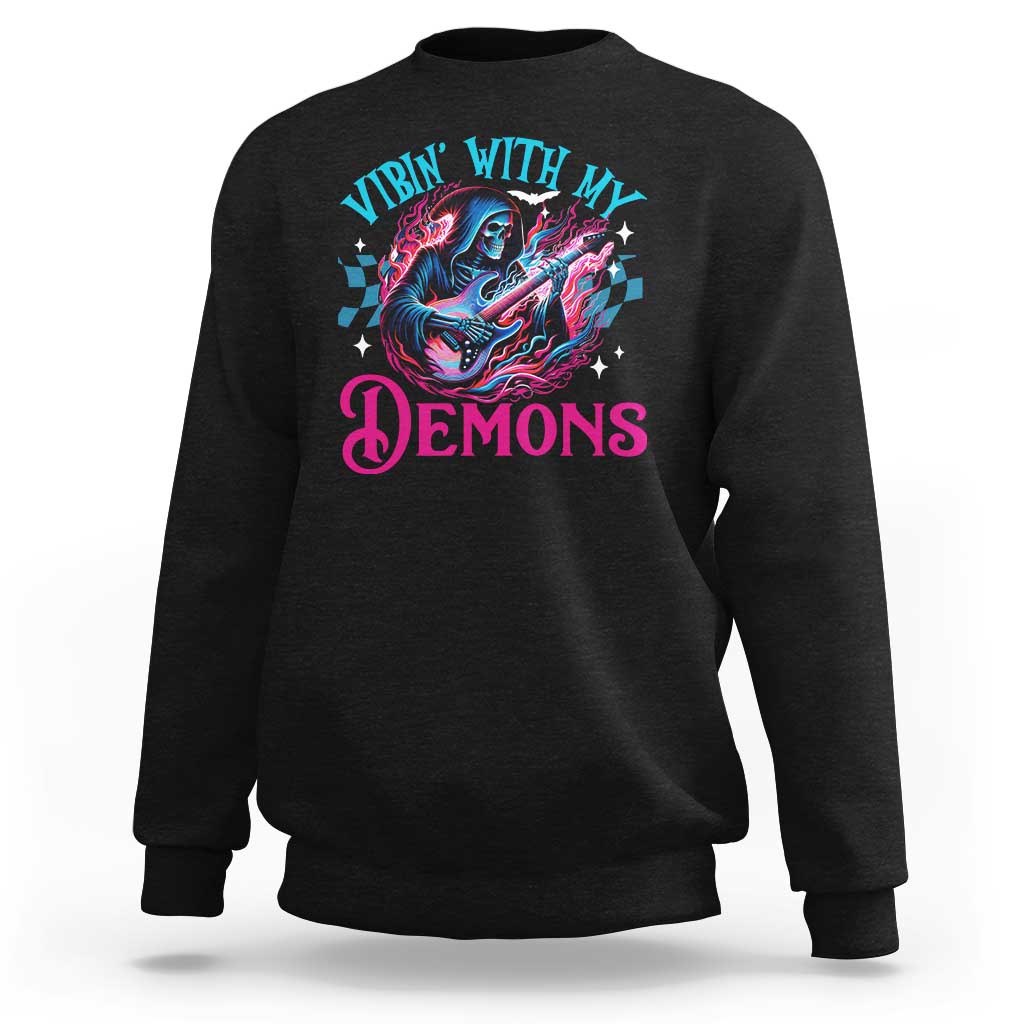 Black crewneck sweatshirt with long sleeves and colorful 'Vibin With My Demons' graphic
