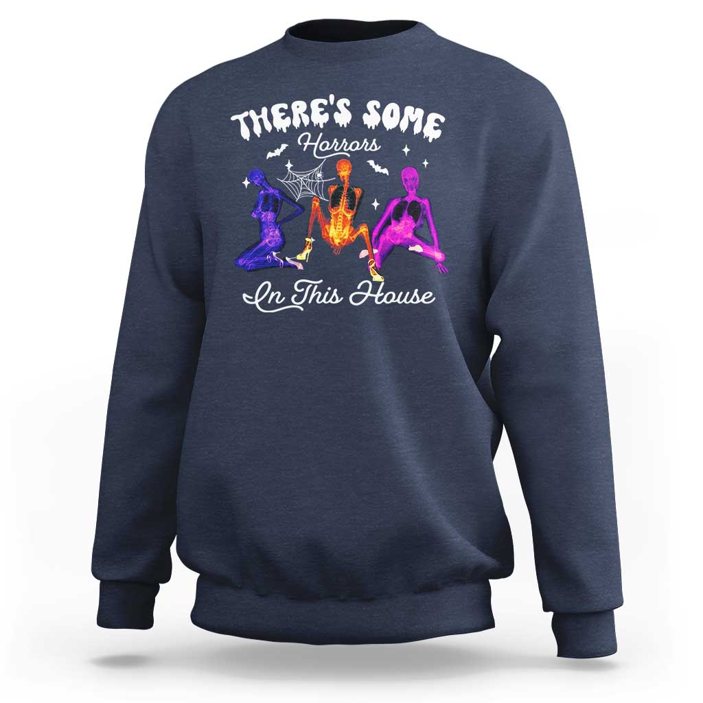 Navy Halloween sweatshirt with glowing horror house graphic on the front