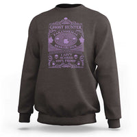 Dark chocolate crewneck sweatshirt with purple Ghost Hunter paranormal researcher graphic