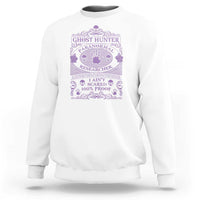 White crewneck sweatshirt with purple Ghost Hunter paranormal researcher graphic