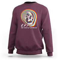 Maroon crewneck sweatshirt with rainbow ghost graphic and “My Kind of Evidence” text