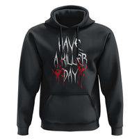 Black Halloween hoodie with dripping white text graphic and red blood splatter, front pocket
