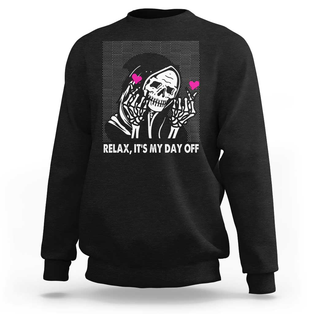 Black crewneck sweatshirt with grim reaper graphic and “Relax, It’s My Day Off” text
