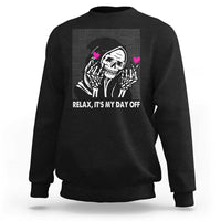 Black crewneck sweatshirt with grim reaper graphic and “Relax, It’s My Day Off” text