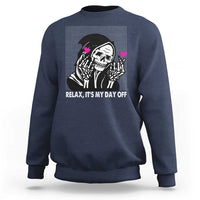 Navy crewneck sweatshirt with grim reaper graphic and “Relax, It’s My Day Off” text