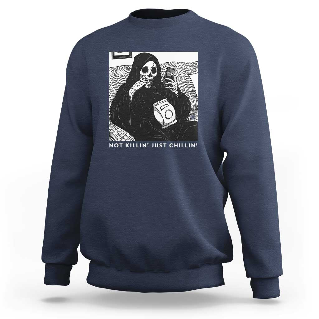 Navy crewneck sweatshirt with grim reaper graphic and chilling slogan text