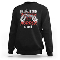 Black Halloween sweatshirt with front graphic reading “Rolling Up Some Horror Spirit”