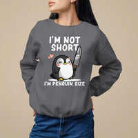 Charcoal crewneck sweatshirt with front penguin graphic and 'I'm not short' text