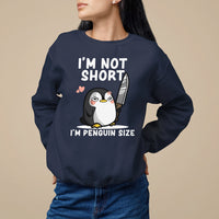 Navy crewneck sweatshirt with front penguin graphic and 'I'm not short' text
