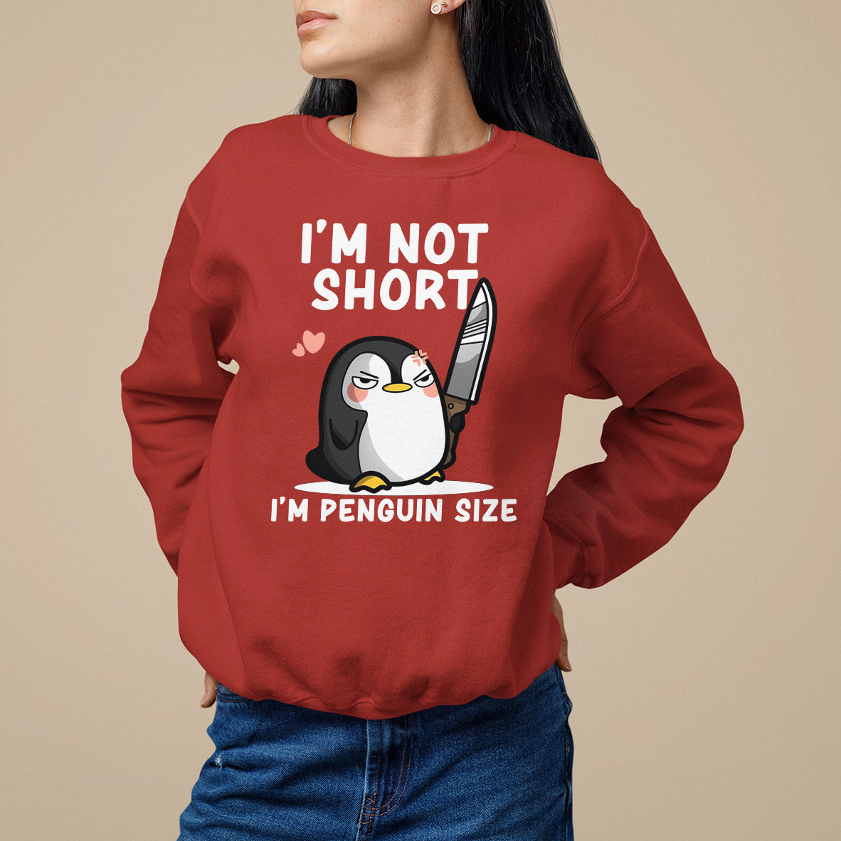 Red crewneck sweatshirt with front penguin graphic and 'I'm not short' text