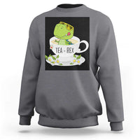 Charcoal gray crewneck sweatshirt with green dinosaur tea graphic on front
