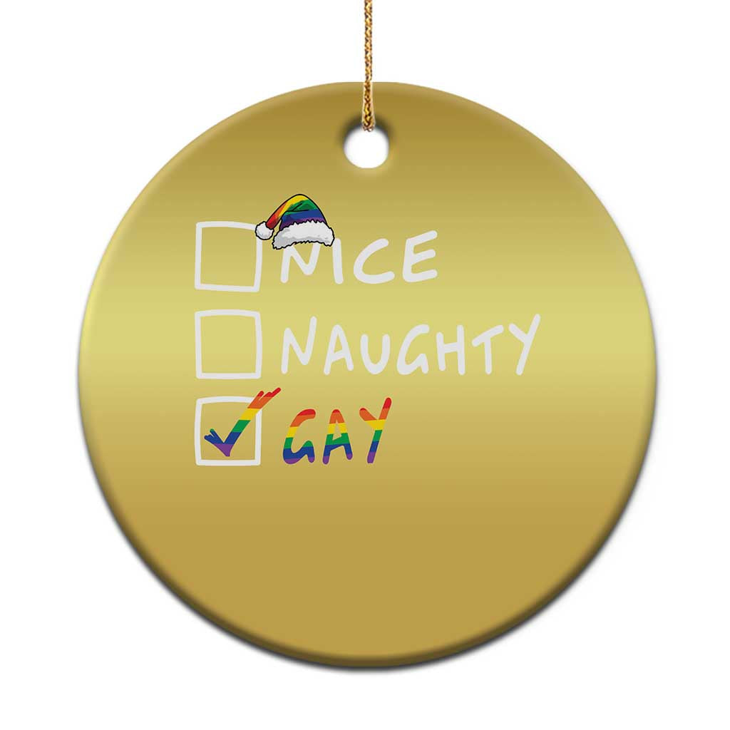 Gold round Christmas ornament with “NICE/NAUGHTY” and “GAY” rainbow check design