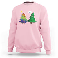 Light pink crewneck sweatshirt with rainbow Christmas tree and green tree graphic