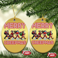 Gold oval Christmas ornaments with Merry Creepmas text and character graphic