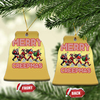 Gold bell-shaped Christmas ornament with Merry Creepmas text and character graphic