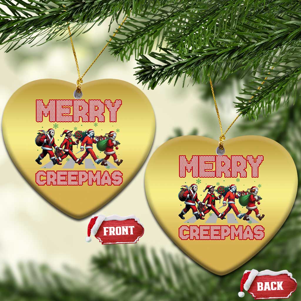 Gold heart-shaped Christmas ornament with Merry Creepmas text and creepy character graphic