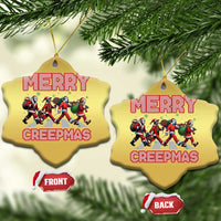 Gold star-shaped Christmas ornament with Merry Creepmas text and character graphic
