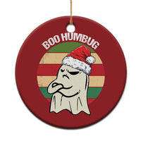 Red round ornament with ghost wearing a Santa hat and the text “BOO HUMBUG”
