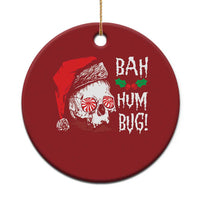 Red round Christmas ornament with skull Santa face and 'BAH HUM BUG!' text, gold loop