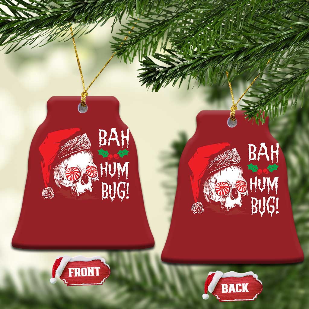Red bell-shaped Christmas ornament with skull Santa graphic and 'BAH HUM BUG!' text, gold loop