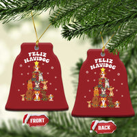 Red bell-shaped Feliz Navidog dog Christmas ornament with gold hanging loop and festive print