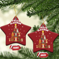 Two red star-shaped Feliz Navidog dog Christmas ornaments with gold loops, front and back