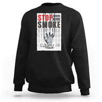 Black unisex sweatshirt with front “STOP SMOKE” graphic print