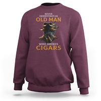 Men's crewneck sweatshirt in maroon with cigar graphic print