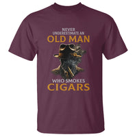 Maroon graphic T-shirt with cigar-smoking man and bold text design on front