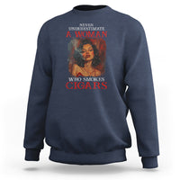 Navy women's crewneck sweatshirt with back graphic of woman smoking cigars