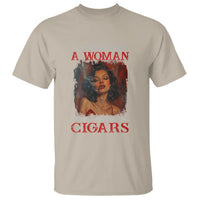 Sand graphic t-shirt with cigar slogan 'A WOMAN' and 'WHO SMOKES CIGARS' print