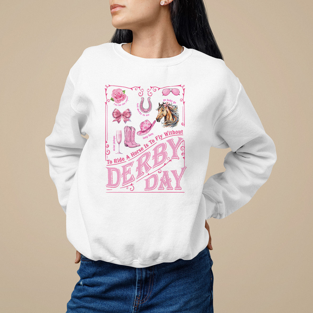 White crewneck sweatshirt with pink Derby Day graphic front, long sleeves